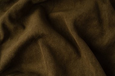 Arka plan olarak yeşil kumaş dokusu. Üst görünüm. 