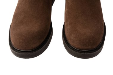 Kahverengi deri çizmeler beyaz arka planda izole edilmiş.. 