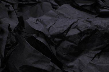 Soyut siyah kağıt dokusu arkaplanı. Üst Manzara. Boşluğu kopyala.