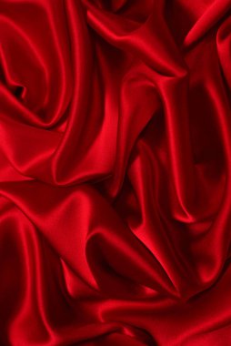 Zengin ve lüks kırmızı ipek kumaş dokusu. Üst görünüm.