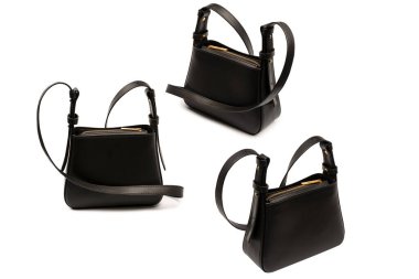 Beyaz arka planda izole edilmiş siyah deri haç ceset torbası..