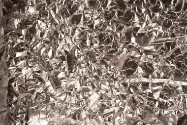 Parlak gümüş folyo arka plan. Üst görünüm.