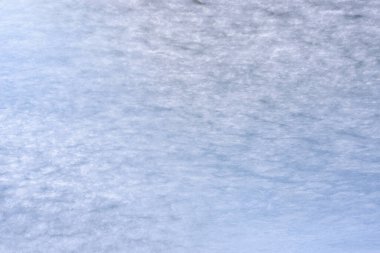 Buzun doğal dokusu, arka plan olarak donmuş göl..