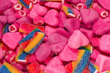 Lezzetli jelibon şekerler. Üst Manzara. Pembe jöleli şeker arka planı.