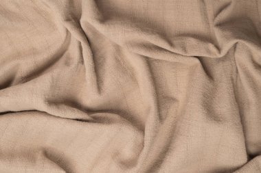 Pamuk bej kumaş desenli. Üst görünüm.