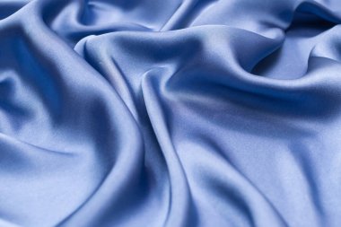 Mavi ipek ya da saten lüks kumaş. Üst görünüm.