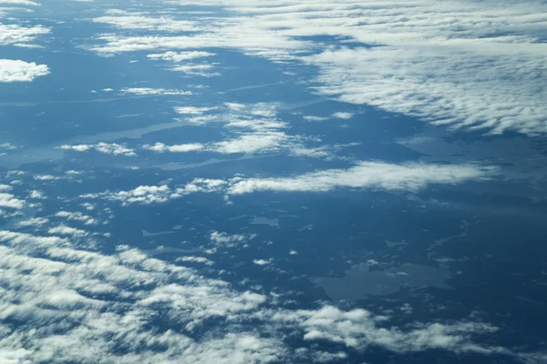 Wind and clouds view from a plane — Stock Photo, Image