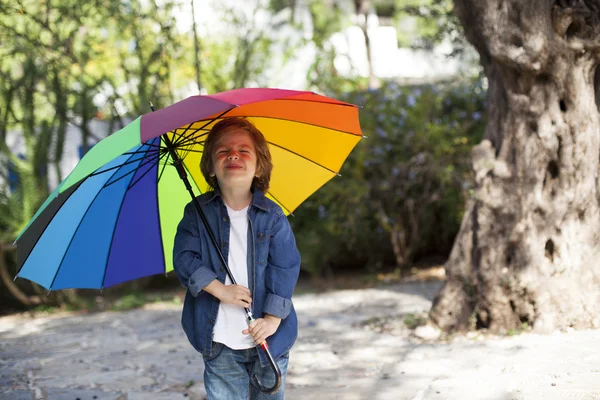 Boy and umbrella — Stock Photo, Image