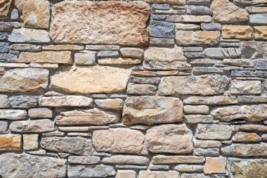 Taş duvar dokusunun arkaplanı, resmi kapat