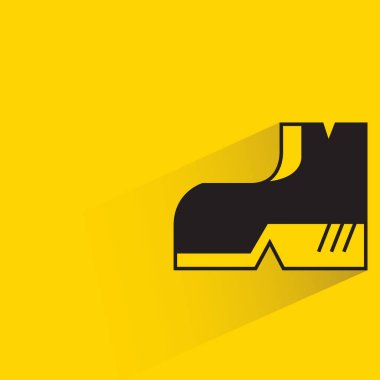 Sarı arkaplanda gölgesi olan çizme