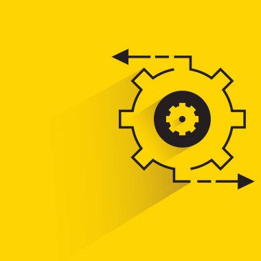 Çark, vites düşürme gölgesi sarı arkaplanda