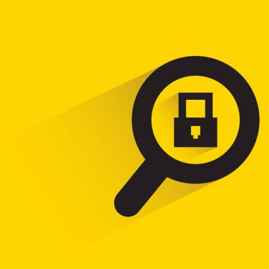 magnifier glass and key encryption with shadow on yellow background