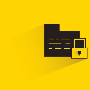 folder and key security with shadow on yellow background