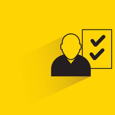 person and check mark with shadow on yellow background