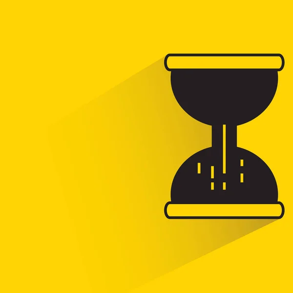 Hourglass Shadow Yellow Background — Vetor de Stock