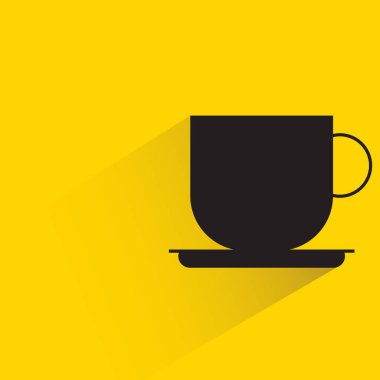 coffee cup with shadow on yellow background