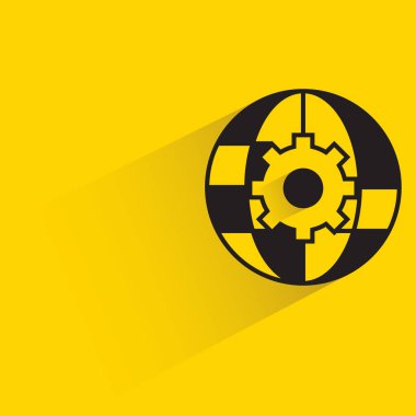 globe and gear with shadow on yellow background