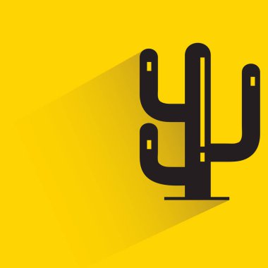 Sarı arkaplanda kaktüs gölgesi