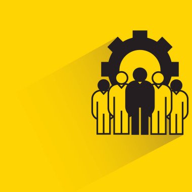 Sarı arka planda bir grup insan ve ekipman