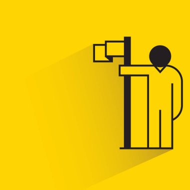 people with flag pole on yellow background