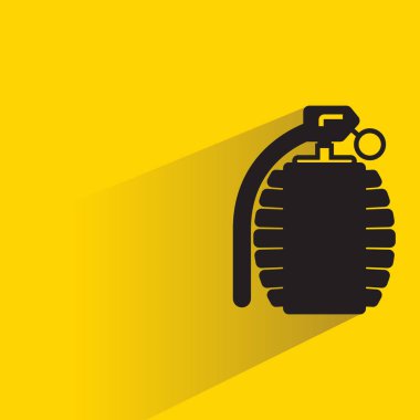 Sarı arkaplanda gölge bırakan el bombası simgesi