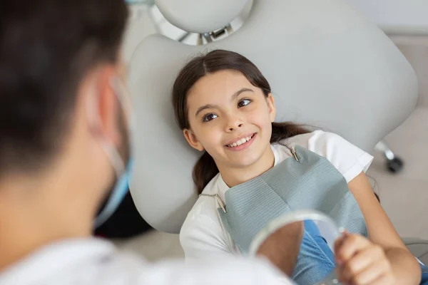 Portrait Girl Sitting Dental Chair Holding Mirror Teeth Overhead View — Stock Photo, Image