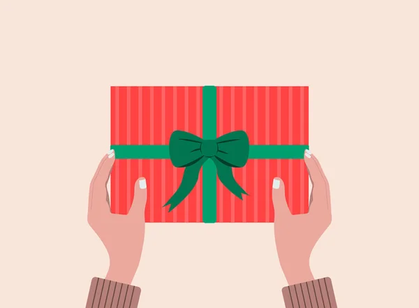 Hediye kutusu elinde. Doğum günü, Şükran Günü, Noel ya da Mutlu Yıllar için bir hediye hazırla Aziz Valentine. Düz vektör çizimi. Eps 10.