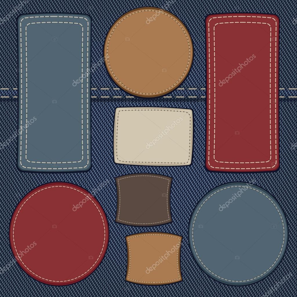 Set of leather labels on denim background