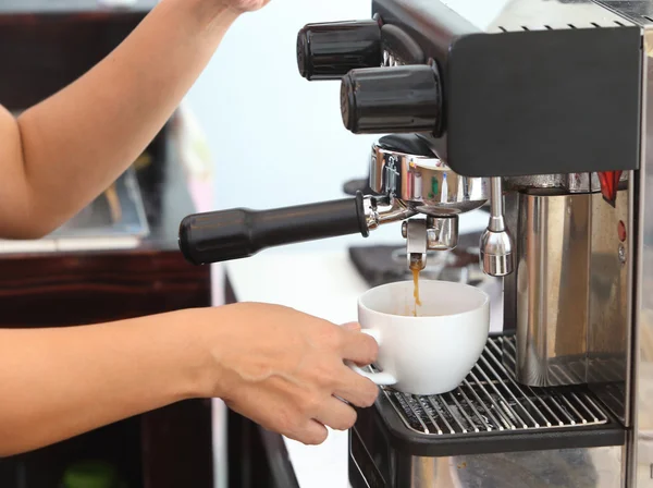 Coffee machine making espresso in a cafe — Stock Photo, Image