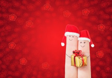 Noel Baba şapkaları hediye kutusu ile parmak yüzleri