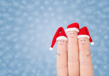 Noel Baba şapkaları parmak yüzleri
