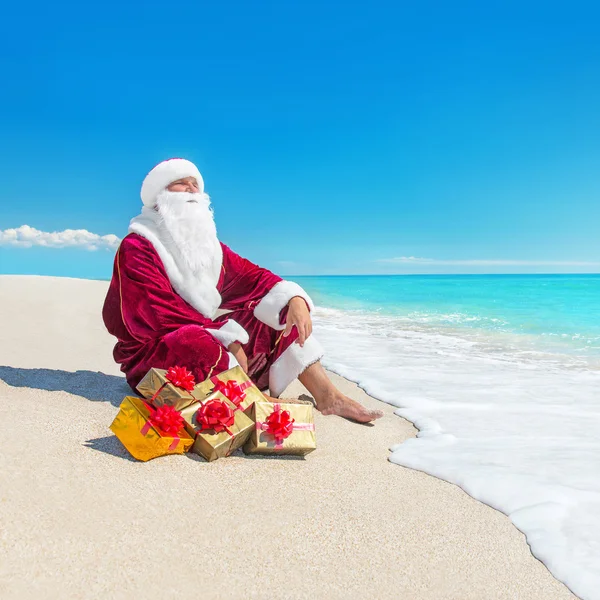 Kerstman met geschenken — Stockfoto