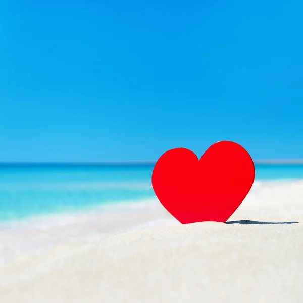 Red heart in sand Stock Image