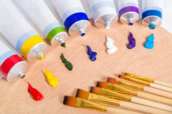 Oil paints tubes and paint brushes