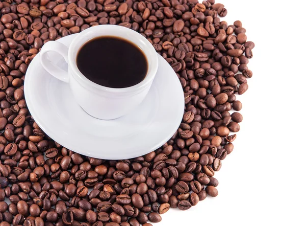 Cup of coffee with saucer and beans — Stock Photo, Image