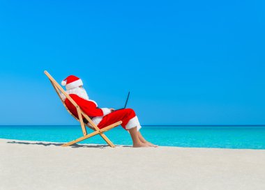 Noel Baba dizüstü kullanarak Beach