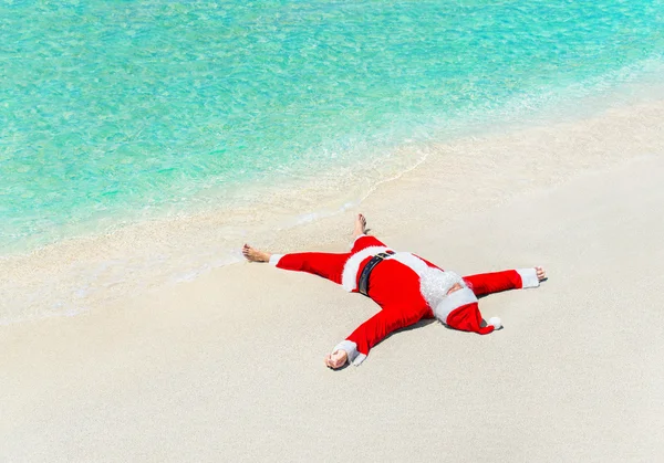 Santa Claus sunbathing — Stock Photo, Image