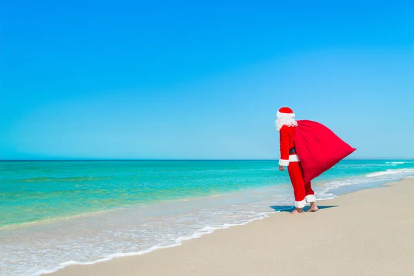 Santa Claus met Kerstmis zak — Stockfoto