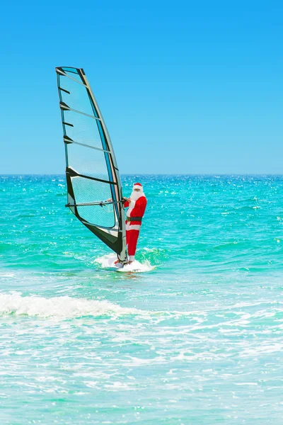 Julemanden windsurfer - Stock-foto