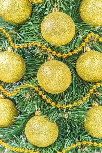 Christmas tree with golden decorations