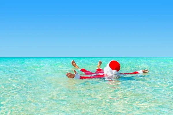 Santa Claus sunbathing — Stock Photo, Image