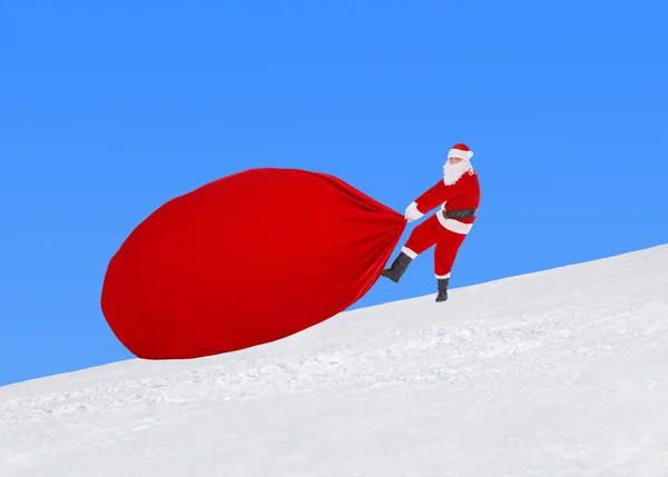 Santa Claus con gran saco —  Fotos de Stock