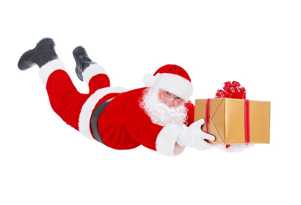 Санта-Клаус с золотой подарочной коробкой — стоковое фото