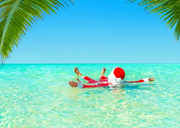 Santa Claus sunbathing — Stock Photo, Image