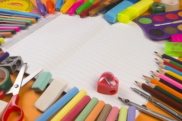 School supplies on notebook — Stock Photo, Image