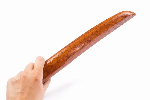 Mão segura tanto de madeira — Fotografia de Stock