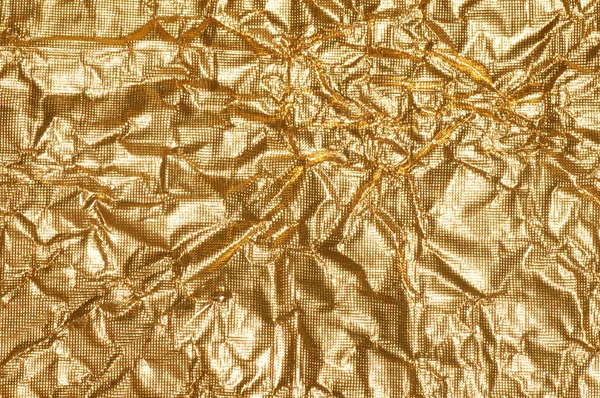 Crumpled gold texture — Stock Photo, Image