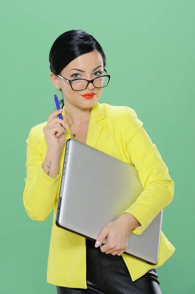 Businesswoman phoning and working with laptop isolated on chroma green background — Stock Photo, Image
