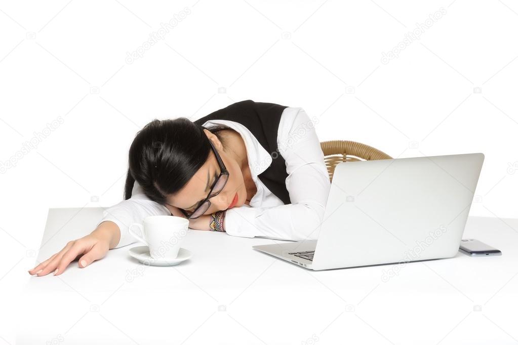 bored young businesswoman has problems while using laptop.isolated on white