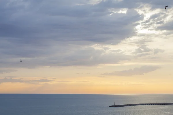 Blick auf das Meer bei Sonnenuntergang Stockbild